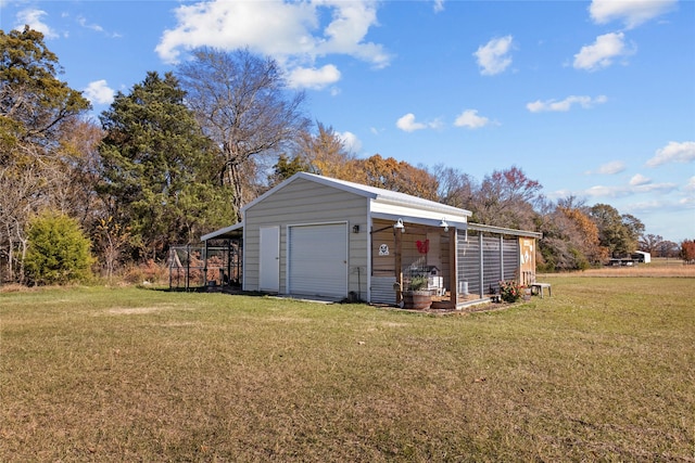 garage featuring a yard