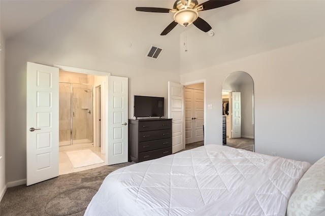 bedroom with carpet floors, ensuite bath, ceiling fan, and high vaulted ceiling