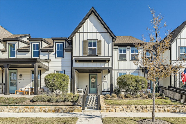 multi unit property featuring a porch