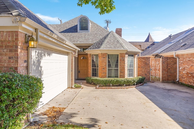 view of front of property with a garage