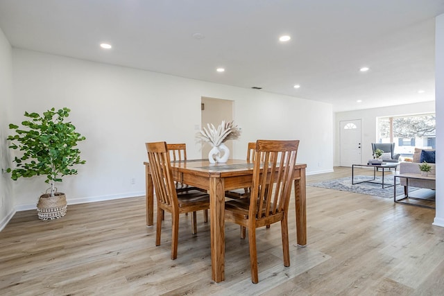 dining space featuring light hardwood / wood-style flooring