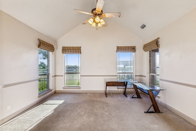 carpeted home office featuring high vaulted ceiling and ceiling fan