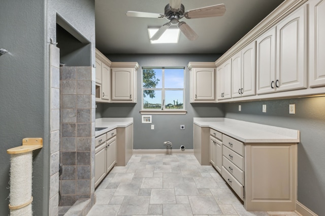 washroom featuring electric dryer hookup, cabinets, hookup for a gas dryer, washer hookup, and ceiling fan