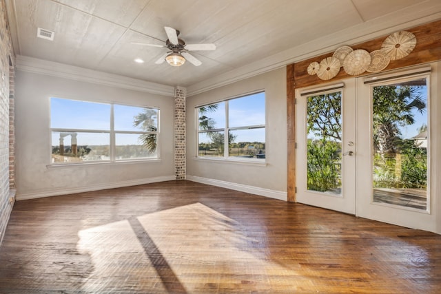 unfurnished sunroom with french doors and ceiling fan