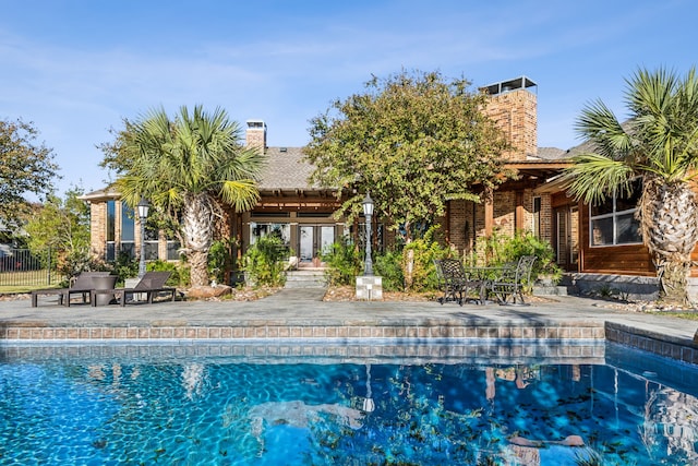 view of pool with a patio area