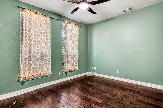 empty room featuring ceiling fan and hardwood / wood-style flooring