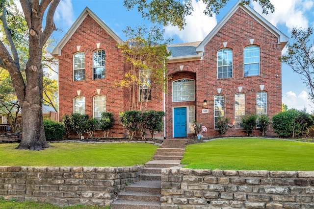 view of front of home with a front lawn