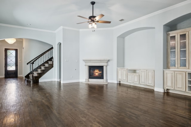 living room featuring ceiling fan, crown molding, and dark wood-type flooring