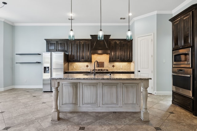 kitchen featuring an island with sink, a kitchen bar, stainless steel appliances, and custom exhaust hood