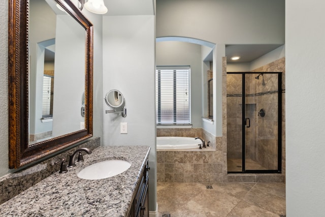 bathroom with tile patterned floors and vanity