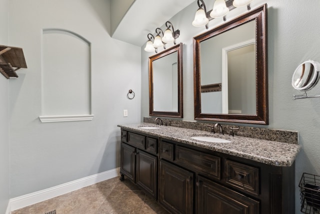 bathroom featuring vanity and tile patterned flooring