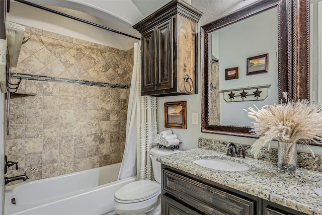 full bathroom featuring shower / bath combo, toilet, and vanity