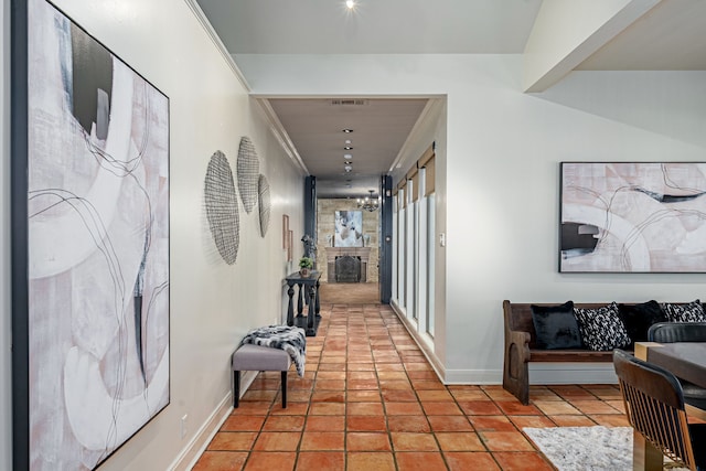 corridor featuring light tile patterned floors