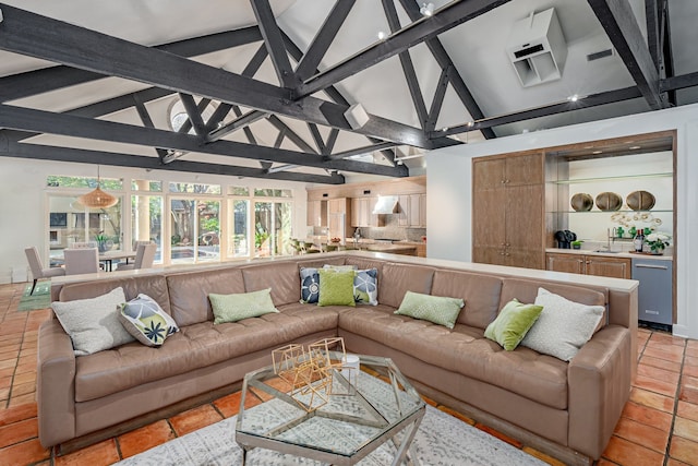 living room featuring beam ceiling, light tile patterned floors, and high vaulted ceiling