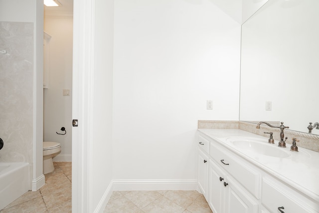 bathroom featuring tile patterned floors, vanity, and toilet