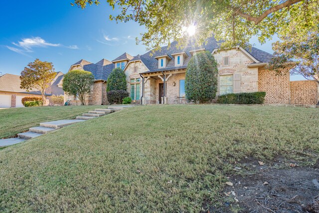 view of front of property with a front lawn