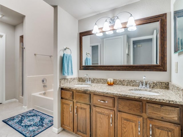 bathroom featuring shower with separate bathtub, vanity, and tile patterned floors