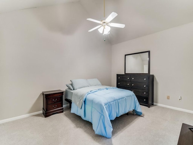 carpeted bedroom with lofted ceiling and ceiling fan