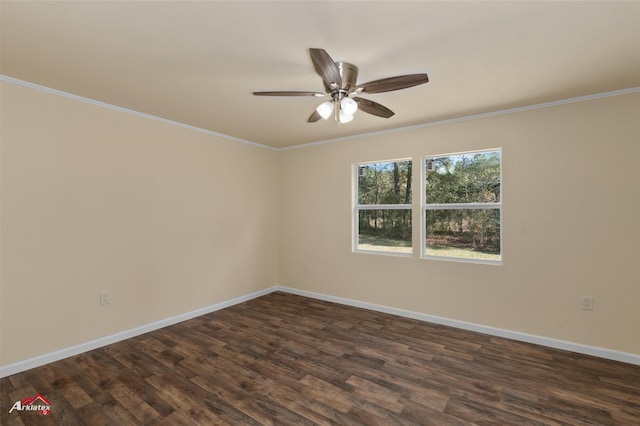 spare room featuring ceiling fan, dark hardwood / wood-style flooring, and crown molding