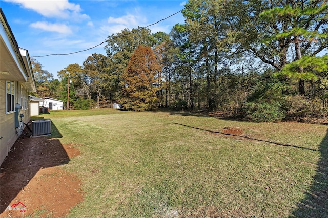 view of yard featuring central AC