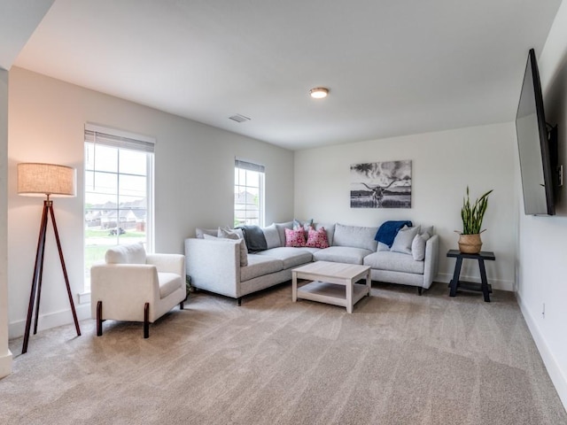 living room with light carpet