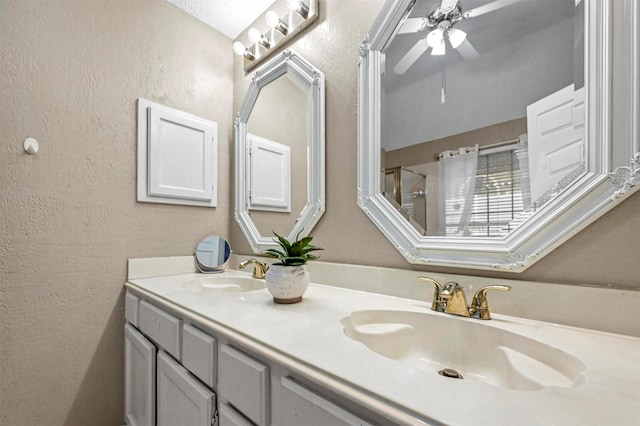 bathroom featuring vanity and ceiling fan