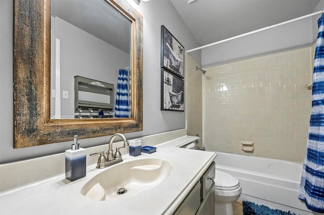 full bathroom featuring tile patterned flooring, vanity, toilet, and shower / bath combo with shower curtain