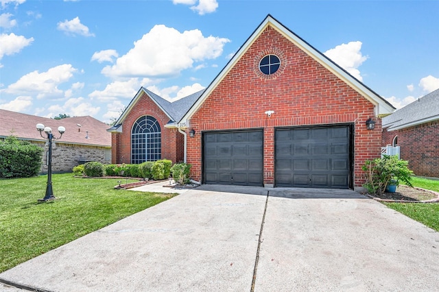 front facade featuring a front yard and a garage