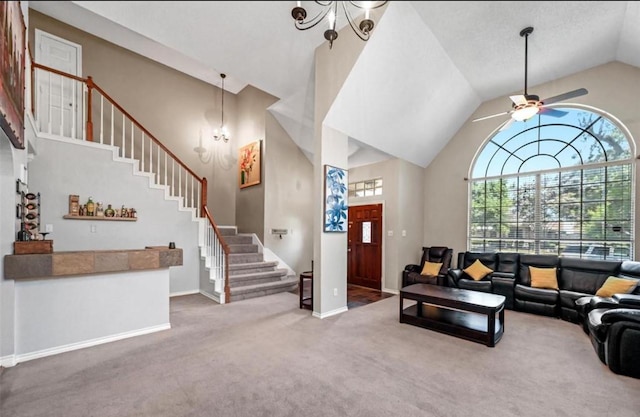 living room featuring ceiling fan, carpet floors, and high vaulted ceiling