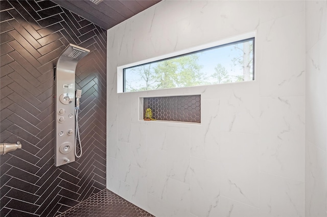 room details with a tile shower