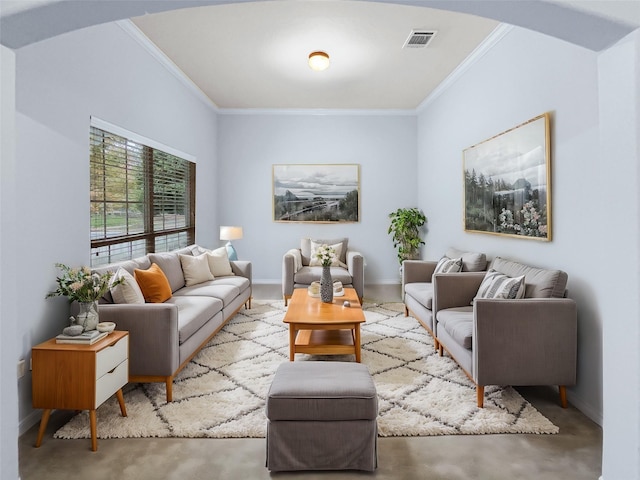 carpeted living room with ornamental molding