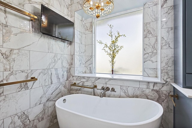 bathroom with a washtub and tile walls