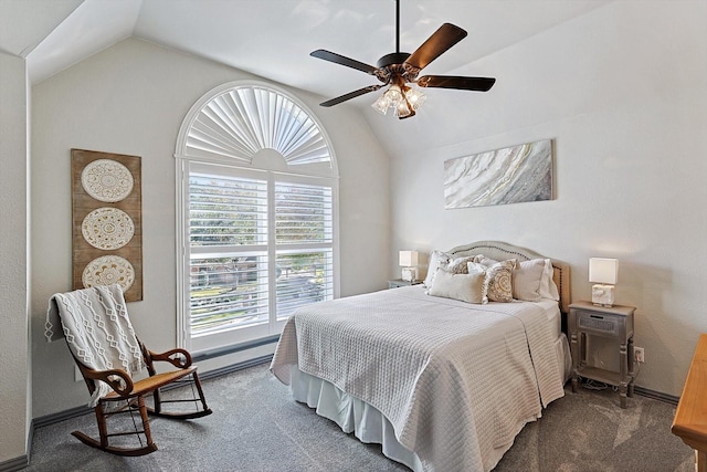 carpeted bedroom featuring ceiling fan and vaulted ceiling