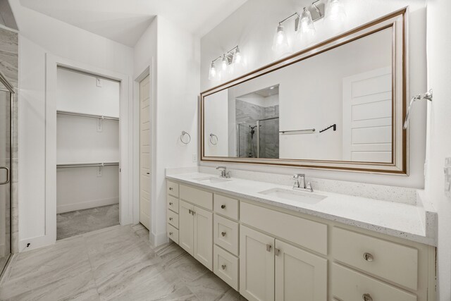 bathroom with vanity and an enclosed shower