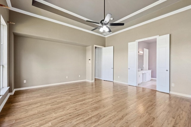 unfurnished room with light hardwood / wood-style floors, ceiling fan, and crown molding