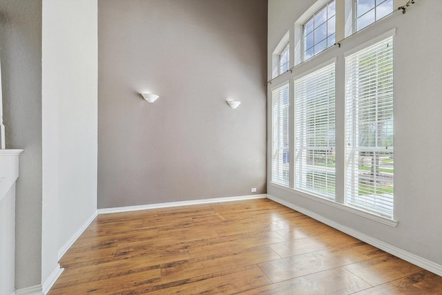 unfurnished room featuring light hardwood / wood-style floors