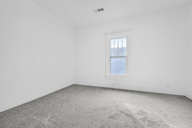 spare room featuring carpet flooring