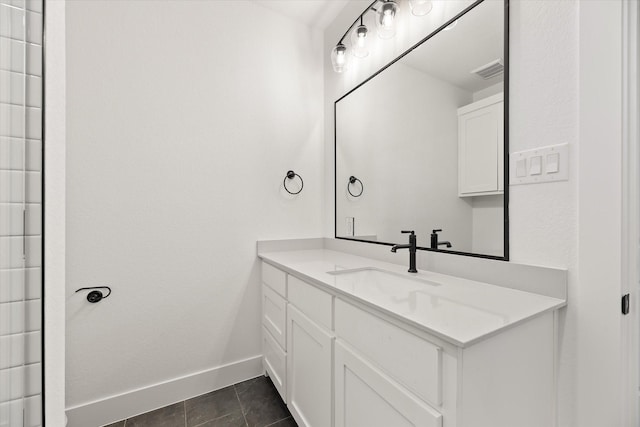 bathroom with vanity and tile patterned floors