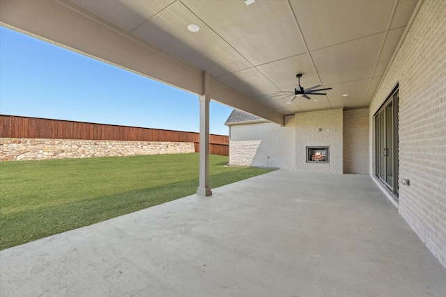 view of patio featuring ceiling fan