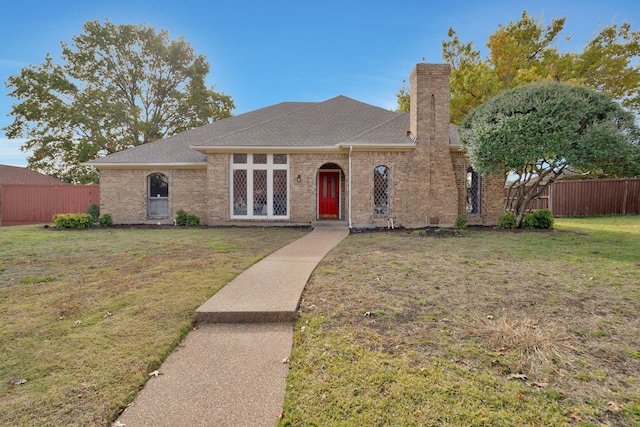 view of front of house with a front lawn