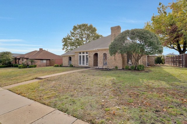 view of front facade with a front yard