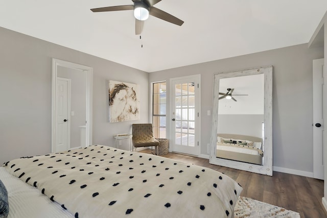 bedroom featuring ceiling fan, dark hardwood / wood-style floors, and access to exterior