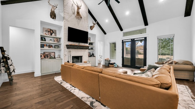 living room with beamed ceiling, dark hardwood / wood-style floors, and high vaulted ceiling