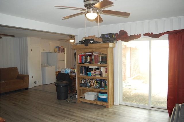 interior space featuring ceiling fan and hardwood / wood-style floors