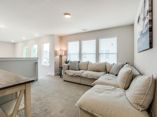 living room featuring light colored carpet