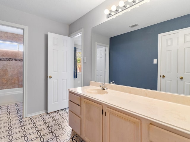 bathroom featuring a bathing tub and vanity