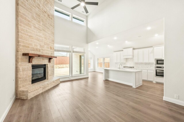 kitchen featuring white cabinetry, sink, and appliances with stainless steel finishes