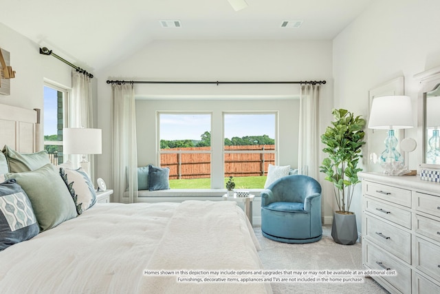 carpeted bedroom featuring lofted ceiling