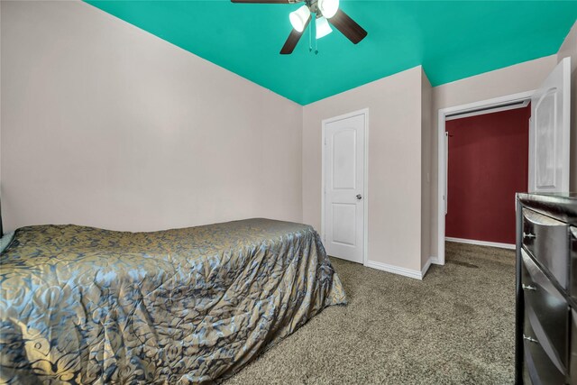 carpeted bedroom with wooden ceiling, ceiling fan, lofted ceiling, and a wall mounted AC