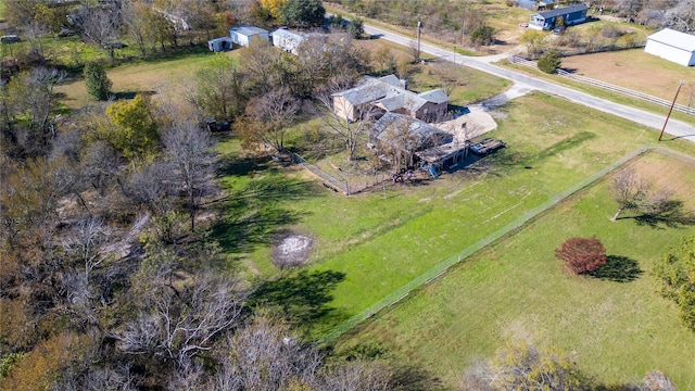 birds eye view of property featuring a rural view